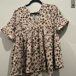 Boutique Entro Neutral Pink Cheetah print tiered top with tassel back! Size L